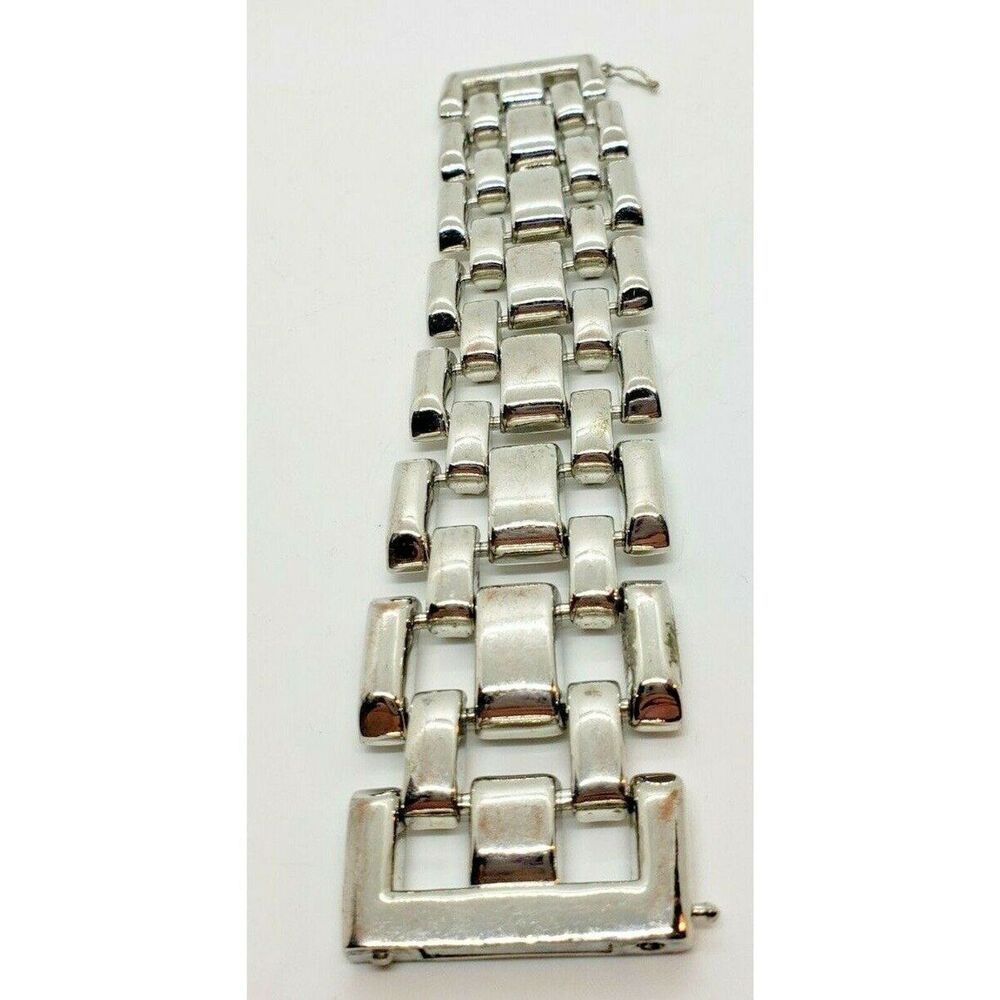 Womans Silver Plated Linked Bracelet with Magnetic Closure and Safety Hook
